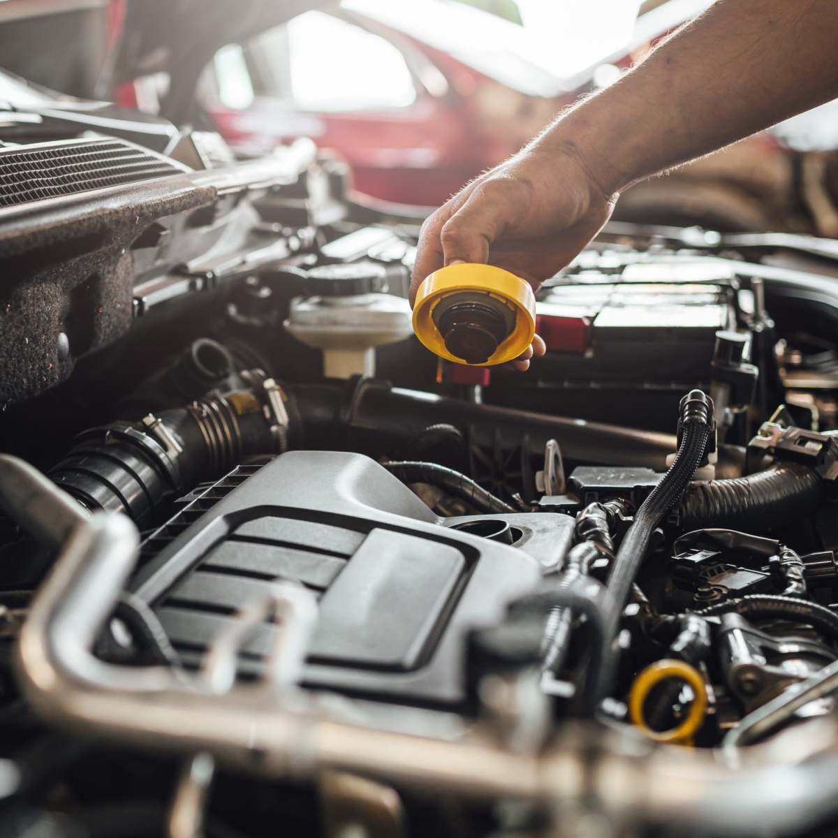 closeup-shot-of-auto-mechanic-hands-doing-car-tech-2023-04-27-03-37-50-utc